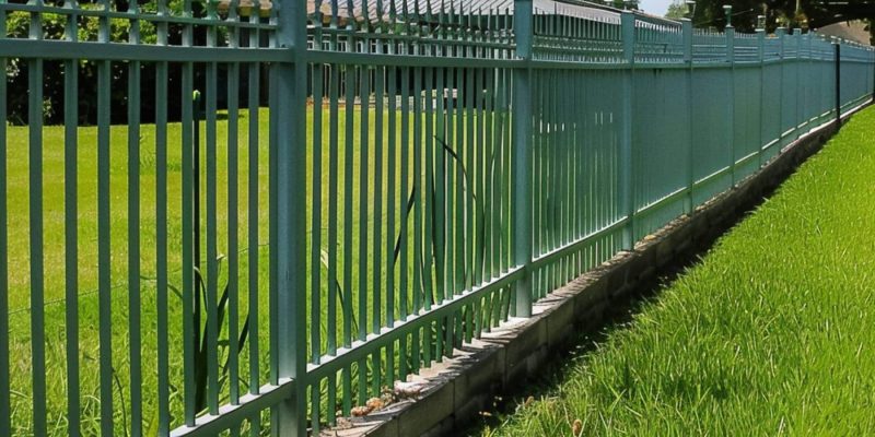 A Side-View of Green Aluminum Fence